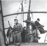  ??  ?? ■ Returning from ‘Feindfahrt’ - Thurmann on the conning tower of U-553 after a succesful patrol. (Kohlmann Collection)