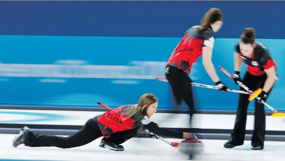  ?? LEAH HENNEL ?? Canada’s Rachel Homan, left, Lisa Weagle, and Joanne Courtney during their game against Switzerlan­d in women’s curling in Gangneung, South Korea, on Sunday.