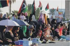  ?? AFP ?? Libyan Muslims gather to perform the Eid Al Adha morning prayer in the centre of Tripoli, on Sunday