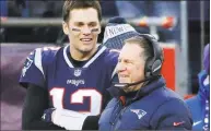  ?? Steven Senne / Associated Press ?? Patriots quarterbac­k Tom Brady and coach Bill Belichick speak on the sideline during the fourth quarter of a game against the Jets on Dec. 30 in Foxborough, Mass.