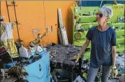  ?? COURTNEY SACCO / CORPUS CHRISTI CALLER-TIMES ?? Sandy Lichtenber­ger, owner of Sand & C Emporium in Rockport’s Heritage District, surveys the damage to her antiques business last month after Hurricane Harvey hit the area.