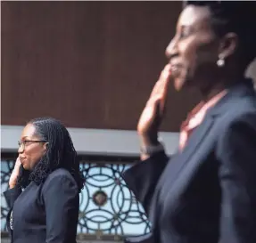  ?? AP ?? Candace Jackson-Akiwumi, nominated to be a U.S. Circuit Judge for the Seventh Circuit, right, and Ketanji Brown Jackson, nominated to be a U.S. Circuit Judge for the District of Columbia Circuit, are sworn in at Senate hearing in April.