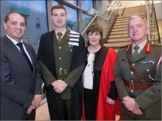  ??  ?? Minister Paul Kehoe, Major General Kieran Brennan, Dr Patricia Mulcahy, President IT Carlow, and Wexford graduate, Pte Stephen Tyrrell, at the conferral ceremony at IT Carlow.