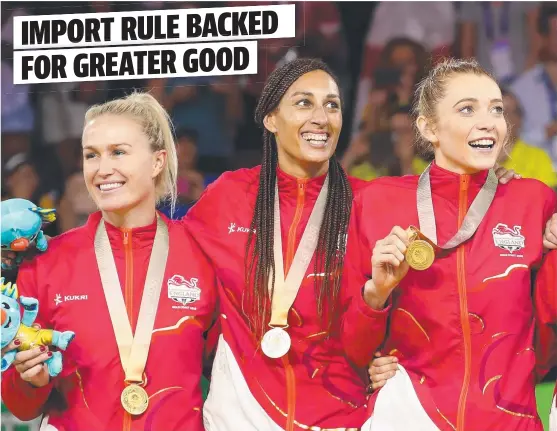  ?? BIG UPSET: English gold medallists Chelsea Pittman, Geva Mentor and Helen Housby at the medal ceremony for the Commonweal­th Games netball final. ??