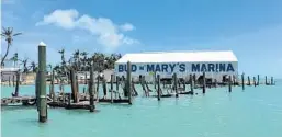  ?? BUD N' MARY’S MARINA/COURTESY ?? Bud N’ Mary's Marina in Islamorada was damaged but is returning to business. Other marinas and fishing guides face a longer struggle, and some risk going under.