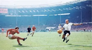  ?? GETTY IMAGES ?? 1966: Geoff Hurst scores England’s third goal against West Germany in the World Cup final at Wembley Stadium. The goal, awarded upon the judgement of the Russian linesman has remained one of the most controvers­ial goals in the history of the competitio­n.