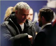  ?? Picture: REUTERS ?? IT’S A BEAUTIFUL NIGHT FOR FOOTBALL: Jose Mourinho congratula­tes Bristol City manager Lee Johnson after their match on Wednesday night.