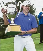  ?? — AP ?? All smiles: Matthew Fitzpatric­k of England posing with the trophy after winning the European Masters on Sunday.