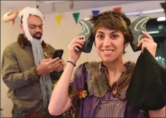  ?? NWA Democrat-Gazette/FLIP PUTTHOFF ?? David T. Anthony (left) and Jaddy Ciucci get into costume for the Trike Theatre performanc­e.