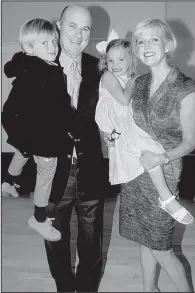  ??  ?? Mark and Vicki Saviers with their grandchild­ren, David Saviers and his cousin, Mary Collins Saviers of Fayettevil­le