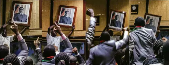  ?? Jekesai Njikizana/AFP ?? Integrante do Parlamento do Zimbábue remove retrato do ditador Robert Mugabe logo após a leitura de sua carta de renúncia, nesta terça-feira (21)