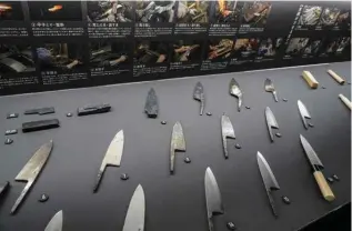  ?? — AFP photos ?? This photo taken on Nov 14, 2023 shows knives on display at the Sakai Traditiona­l Crafts Museum in the city of Sakai, Osaka prefecture.