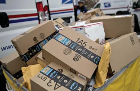  ?? ANDREW HARRER/BLOOMBERG ?? Since October, a couple in Massachuse­tts has received more than 20 unsolicite­d Amazon packages containing a variety of “techy gizmo stuff.”