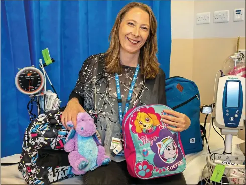  ??  ?? Rescuing the vulnerable:
Dr Gayle Hann set up a “kid’s kit” scheme that donates rucksacks filled with clothes and toys to children going into emergency foster care