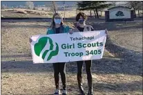  ?? COURTESY OF DAVID WATKINS ?? Mia Austin and Eavan Burke from Troop 3405 are out selling cookies.