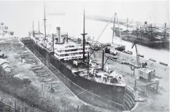  ?? COPIES OF PICTURE AVAILABLE FROM ODT FRONT OFFICE, LOWER STUART ST, OR WWW.OTAGOIMAGE­S.CO.NZ ?? THE steamship Tasmania in dock at Port Chalmers for examinatio­n and repairs following a beaching at Bluff. — Otago Witness, 23.5.1922