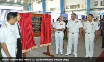  ?? PHOTOGRAPH­S: Indian Navy ?? Chief of the Naval Staff Admiral D.K. Joshi unveiling the induction plaque