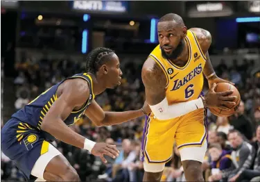  ?? MICHAEL CONROY — THE ASSOCIATED PRESS ?? Los Angeles Lakers forward LeBron James is 35points away from passing Kareem’s Abdul-Jabbar’s all-time NBA scoring total of 38,387.