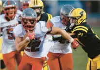  ?? RICK KINTZEL/THE MORNING CALL ?? Parkland running back Trey Tremba breaks several tackles on his way to a touchdown against Freedom during Friday’s Eastern Pennsylvan­ia Conference game at Bethlehem Area School District Stadium.