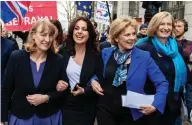  ?? CHRIS J RATCLIFFE/GETTY IMAGES ?? Former Labour MP Joan Ryan, left, links arms with former Tory MPs Heidi Allen, Anna Soubry and Sarah Wollaston after their resignatio­ns on Wednesday.