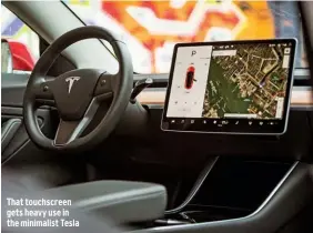 ??  ?? That touchscree­n gets heavy use in the minimalist Tesla
