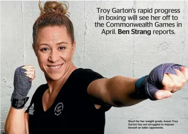  ??  ?? Short for her weight grade, boxer Troy Garton has not struggled to impose herself on taller opponents.