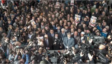  ??  ?? Journalist­s take images during a symbolic funeral prayer for Saudi journalist Jamal Khashoggi, killed and dismembere­d in the Saudi consulate in Istanbul, at the courtyard of Fatih mosque in Istanbul. — AFP photo