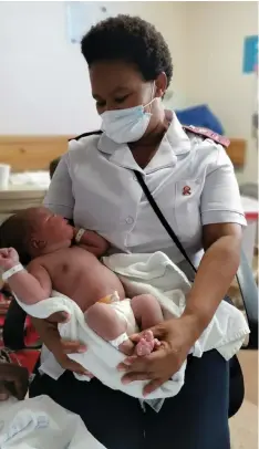  ??  ?? SHORTLY after becoming the first South African to receive the Johnson & Johnson Covid19 vaccine, nurse Zoliswa Gidi-Dyosi delivered a healthy baby boy, weighing 5kg, at Khayelitsh­a District Hospital.