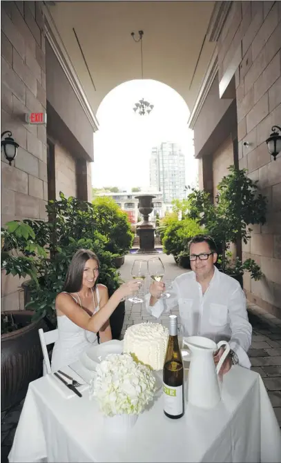  ?? ARLEN REDEKOP PHOTO/ PNG ?? Dorian Banks and Tessa Sam will be taking part in Dîner en Blanc, a major pop- up public dinner event coming to Vancouver on Aug 30. They’ll have to bring their own table, tablecloth­s and dress in white for the evening.