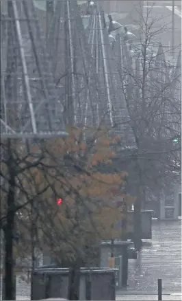  ??  ?? A deserted Buchanan Street in Glasgow yesterday as heightened coronaviru­s restrictio­ns begin