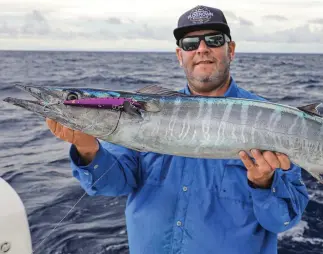  ??  ?? RUN DEEP: A sturdy, lipped diving plug pulled fast on wire leader does the job on wahoo holding deep.