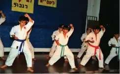 ?? (Wikimedia Commons) ?? CHILDREN PRACTICE karate in Lod. Traditiona­l martial arts are most beneficial in reducing anger and violent behaviors, the study showed.