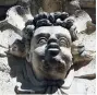  ??  ?? This mascaron with puffed-out cheeks may represent the wind