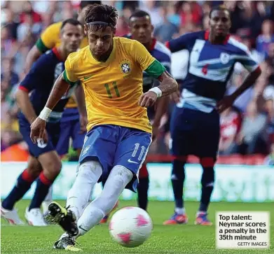  ?? GETTY IMAGES ?? Top talent: Neymar scores a penalty in the 35th minute