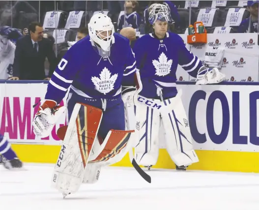  ?? JACK BOLAND/POSTMEDIA NETWORK/FILES ?? Michael Hutchinson, left, is out as the Leafs backup goalie after going winless through his first six games. Kasimir Kaskisuo replaces him.