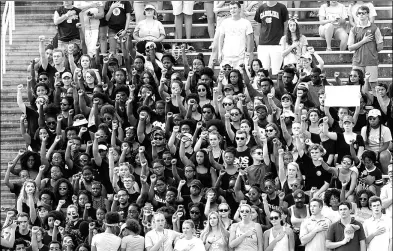  ?? STREETER LECKA / AGENCE FRANCE-PRESSE ?? Students protest during the national anthem before the start of the Pittsburgh Panthers and North Carolina Tar Heels game at Kenan Stadium on Saturday in Chapel Hill, North Carolina.