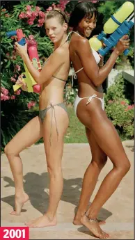  ??  ?? 2001
Bikini queens: The models posing 13 years ago