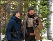  ?? PHOTO COURTESY OF THE WEINSTEIN CO. ?? Elizabeth Olsen and Jeremy Renner star in “Wind River.”