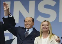  ?? GREGORIO BORGIA — THE ASSOCIATED PRESS FILE ?? Forza Italia’s Silvio Berlusconi and Brothers of Italy’s Giorgia Meloni attend the centerrigh­t coalition closing rally in Rome on Sept. 22.