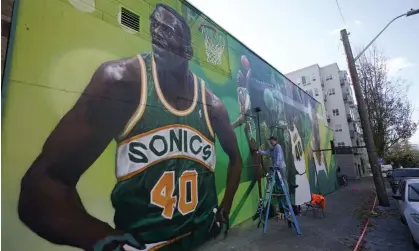  ?? ?? A mural in downtown Seattle is a reminder of the place the SuperSonic­s held in the hearts of NBA fans in the city. Photograph: Ted S Warren/AP