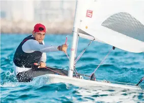  ??  ?? Mohit Saini in action during the Laser Standard race in Hussain Sagar Lake on Tuesday.