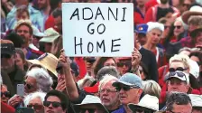  ?? PHOTO: REUTERS ?? People protesting against Adani’s Carmichael coal mine project, at Bondi Beach in Australia