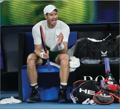  ?? ?? Andy Murray recovered from two sets down to Thanasi Kokkinakis to win their second- round match