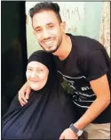  ??  ?? This undated image shows Ghaliya AbdelWahab, who died from COVID-19 on April 6, poses for a photograph with her grandson. (AP)