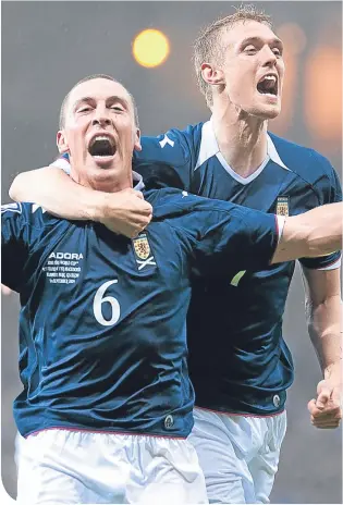  ??  ?? Scott Brown and Darren Fletcher had some happy times together with Scotland