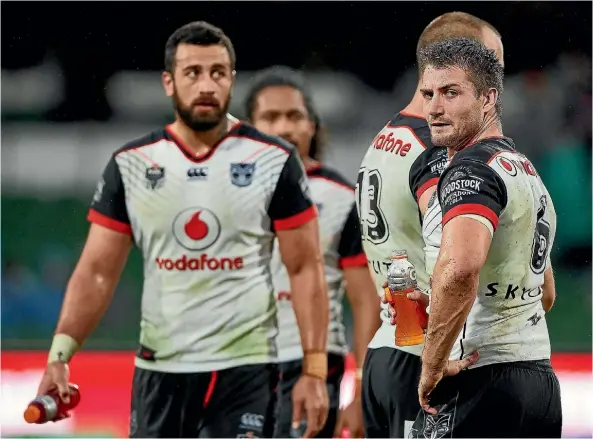  ??  ?? Kieran Foran and Ben Matulino react after the defeat against the Sea Eagles in Perth in round 17.