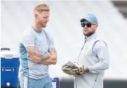  ?? REUTERS ?? England captain Ben Stokes, left, talks to head coach Brendon McCullum during training.