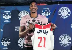  ?? SUSAN WALSH / THE ASSOCIATED PRESS FILES ?? Washington Wizards’ Dwight Howard made public his plans to play pro hoops “for another good eight years.”