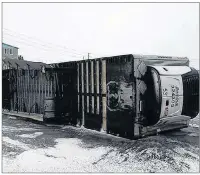  ??                         ?? A trailer turned over on its side is shown in this photo provide by Terry Osmond after high winds in Port- aux- Basque, N. L. on Monday.