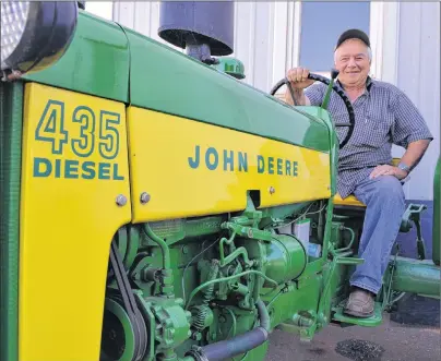  ?? ERIC MCCARTHY/JOURNAL PIONEER ?? A 1959 John Deere 435 Diesel is one of Garth Wilkie’s go-to tractors for the West Prince Tire Iron Club’s annual antique tractor run.